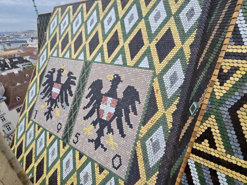 Colorful mosaic tiles that cover the rebuilt roof of St. Stephen's Cathedral.