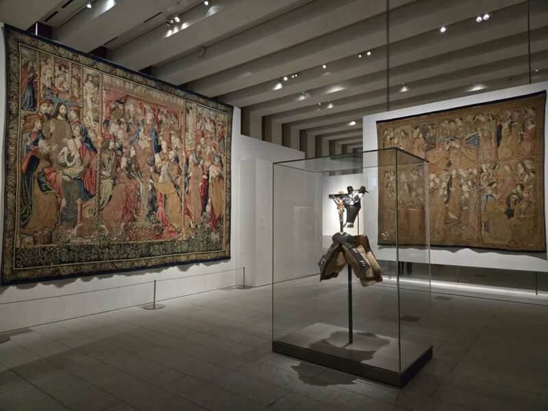 Tapestries and armor on display at the Gallery of the Royal Collections in Madrid.